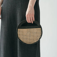 Round Leather Bag with Cane Accent