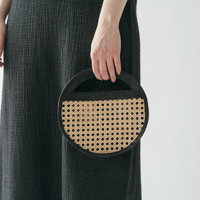 Round Leather Bag with Cane Accent